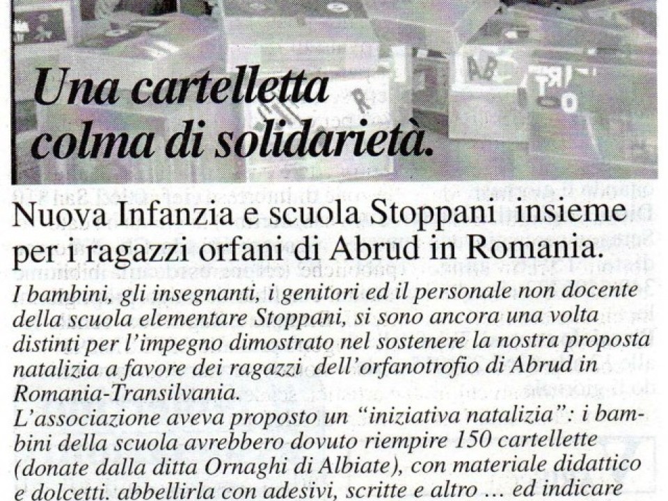 2001-12-12-Una-cartelletta-colma-di-solidarieta